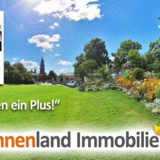 Symbolbild mit zufriedenen Kunden und dem Stadtpark Freiburg im Hintergrund